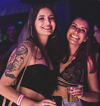 ladies smiling in a club